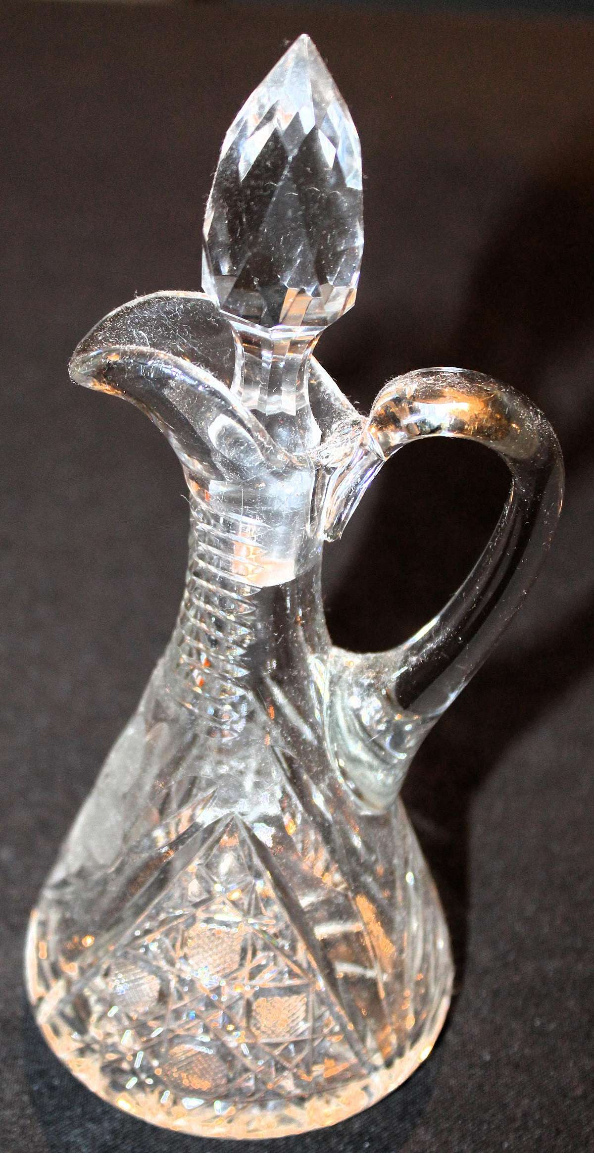 Up for sale is this Beautiful Glass Etched Cruet in great condition with no chips or cracks. It measures approx. 6 1/4 inches tall without the stopper & about 3 1/2 inches wide at the base. Shipping Excludes: Alaska/Hawaii, US Protectorates, APO/FPO,