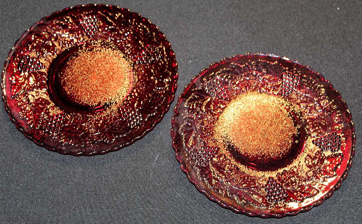 Up for sale is this Imperial Glass Grape Ruby Red Set Of Two Luncheon Plates in great condition with no chips or cracks. They Measure approx. 8 7/8"W.Shipping Excludes: Alaska/Hawaii, US Protectorates, APO/FPO, PO BoxShipping Provided to the United