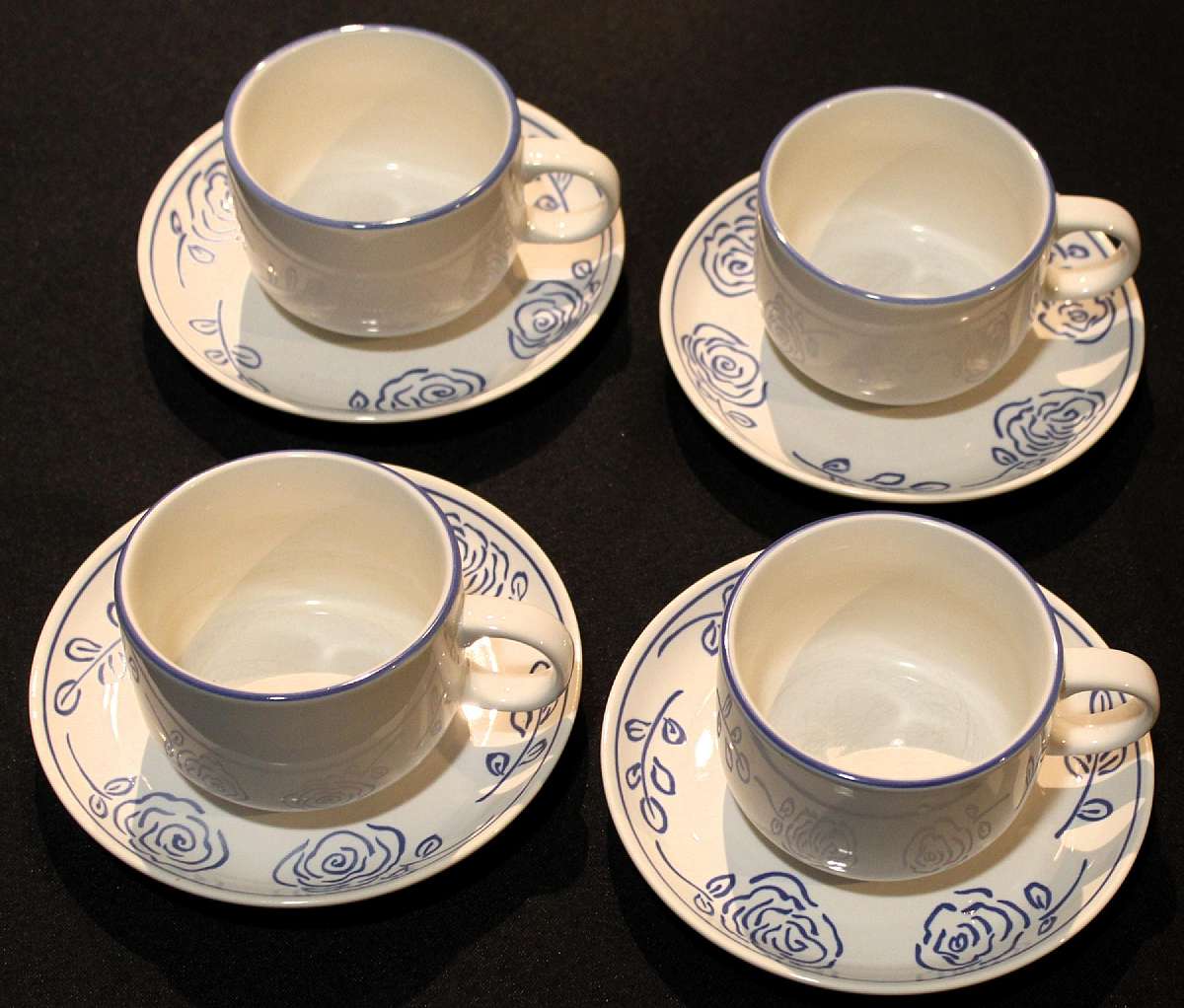 Up for sale are these Rare Signature Blue Floral Silhouette Flowers Pattern SIG6 Set Of Four Cup & Saucer Sets in Very Good condition with no chips or cracks. The Cups measure approx. 2 1/2"T & the saucers 6 1/8"W. Some utensil marks from use. Please see