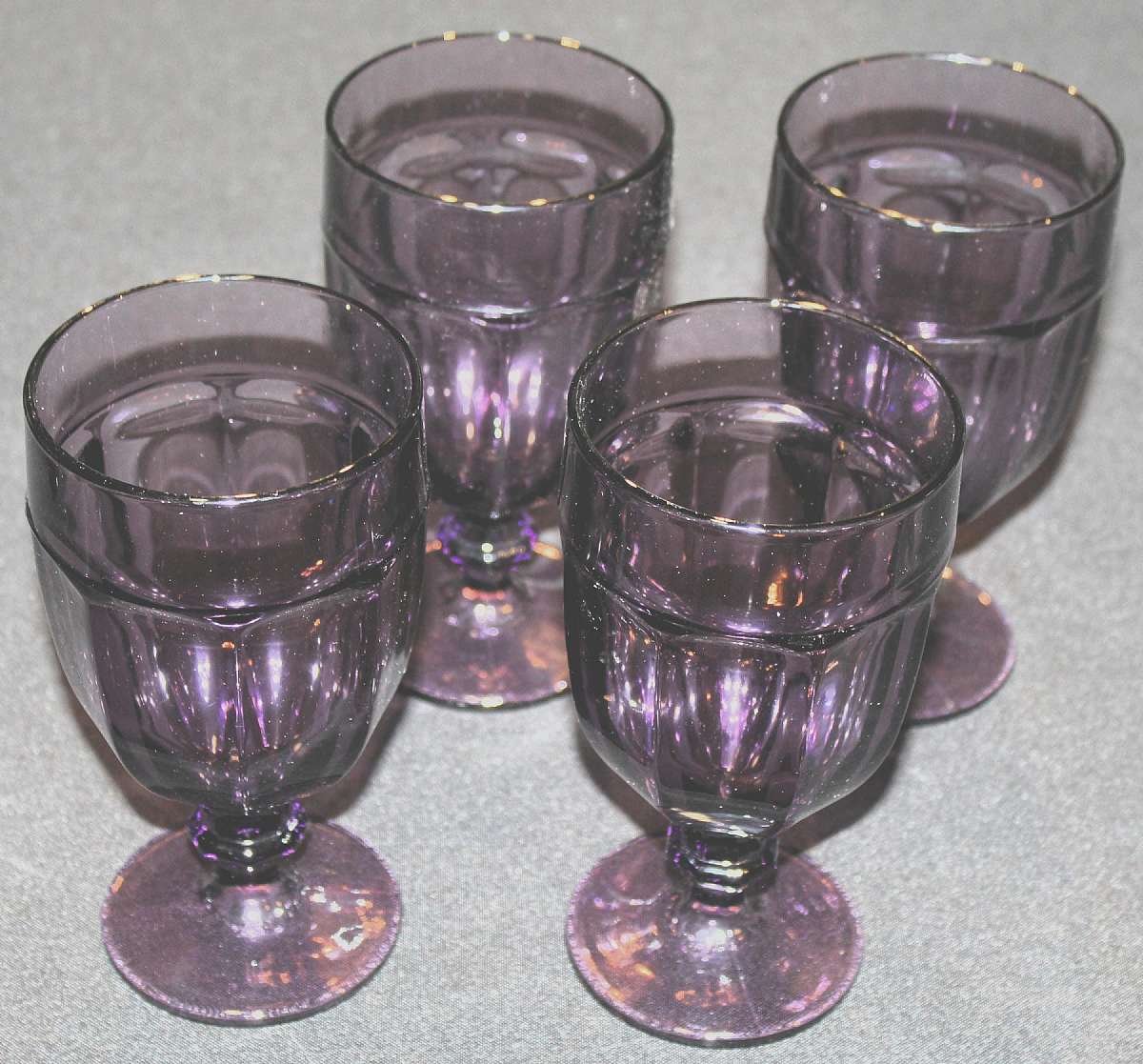 Up for sale are these Libbey Gibraltar Violet (Deep Purple) Set Of Four Iced Tea Glasses in excellent condition with no chips or cracks. They measure approx. 7"T by 3 5/8"W.  Shipping Excludes: Alaska/Hawaii, US Protectorates, APO/FPO, PO BoxS