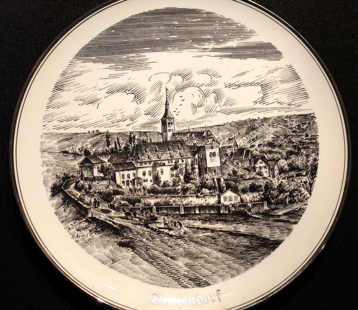 Up for sale is this Reutter Porzellan West Germany Denfendorf Decorative Charger in excellent condition with no chips or cracks. It measures approx. 11 5/8 inches wide. Shipping Excludes: Alaska/Hawaii, US Protectorates, APO/FPO, PO Box Shipping Provided