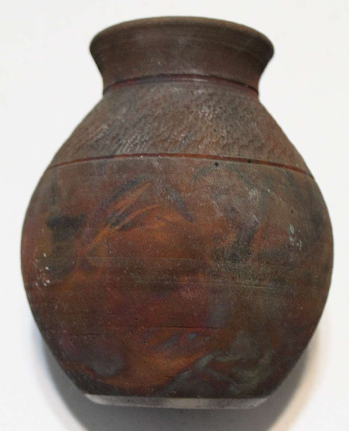Up for sale is this McKee Pottery Wood Fired Raku vase in great condition with no chips or cracks. Has a gritty surface to it like sand paper. The item measures approx. 7"T. Signed McKee on the reverse. The first two pictures were taken without using a fl