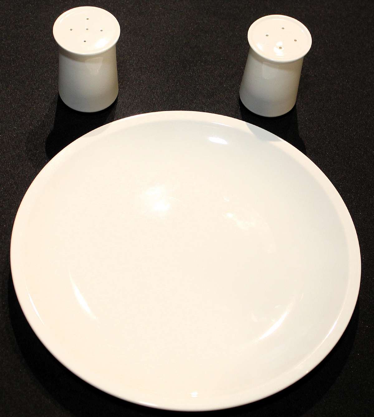 Up for sale are these Mikasa Epiqure White Round Chop Platter & Salt And Pepper Shakers in excellent condition with no chips or cracks. The platter Measures approx. 12 1/8"W.  Shipping Excludes: Alaska/Hawaii, US Protectorates, APO/FPO, PO BoxS