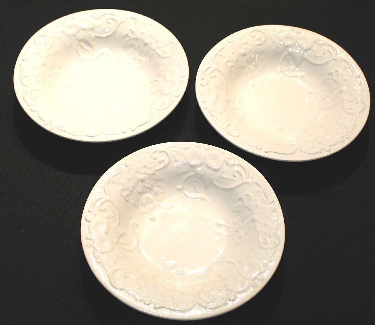 Up for sale are these Bordallo Pinheiro Flowers White Set of Three Soup Bowls Set of in Excellent condition with no chips or cracks or Crazing, The Bowls measure approx. 9 1/4"W. Please see my other sales for more of this beautiful pattern.Shipping