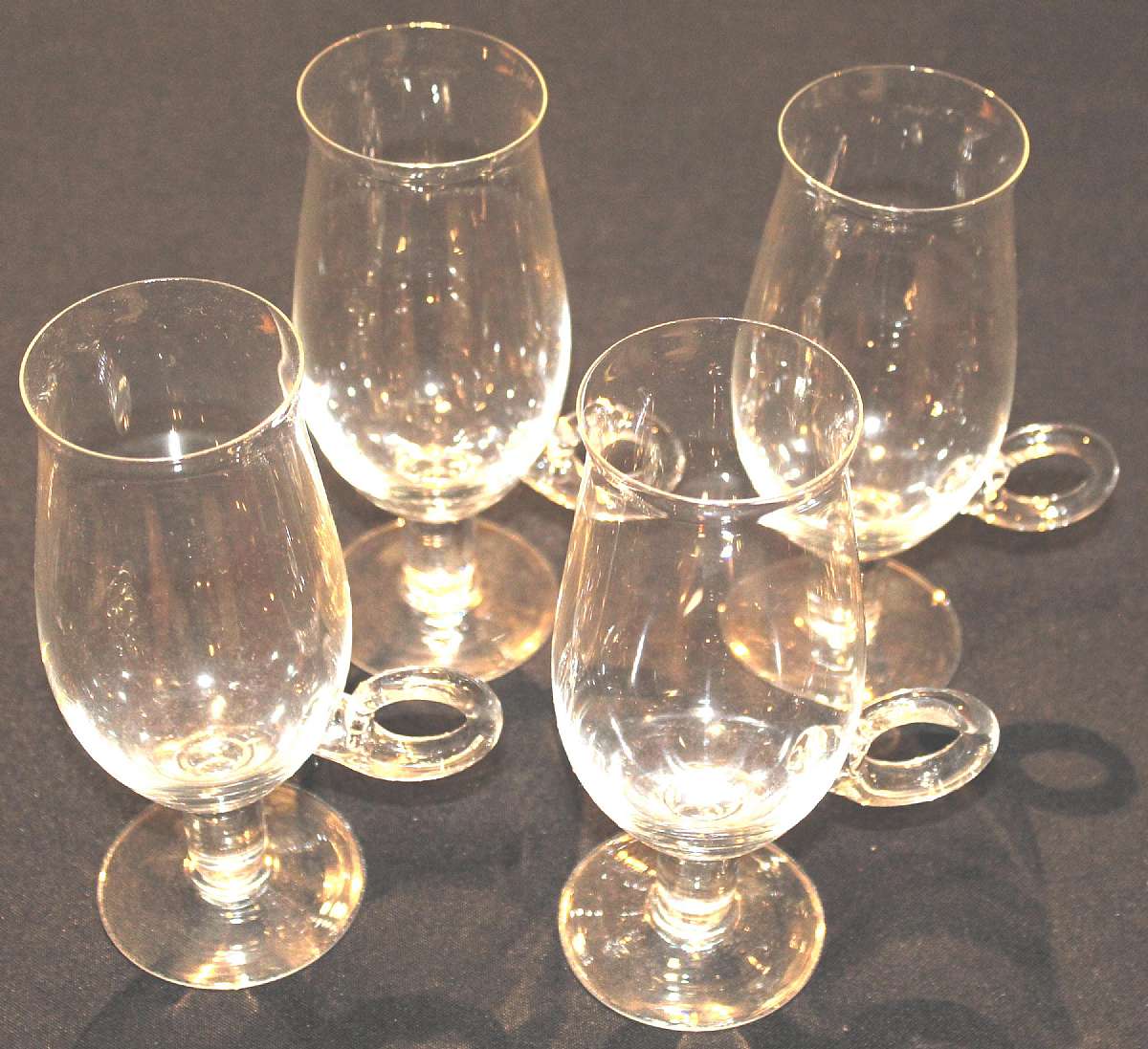 Up for sale are these Toscany Glass Set Of Four Blown Irish Coffee Mugs in excellent condition with no chips.  They measure approx. 6 1/2"T by 2 1/4"W. Shipping Excludes: Alaska/Hawaii, US Protectorates, APO/FPO, PO BoxShipping Provided to the